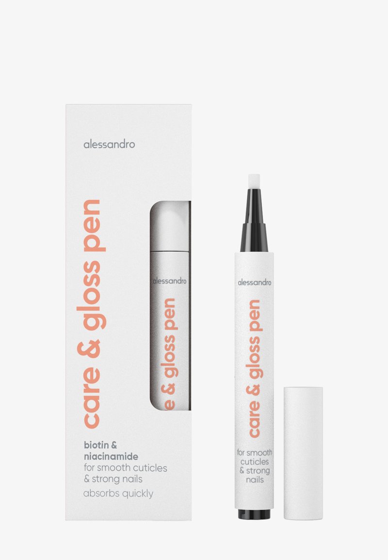 Vit vård- och glanspenna med svart spets, med en silverdetalj. Förpackningen har orange text och produktinformation på en vit box.