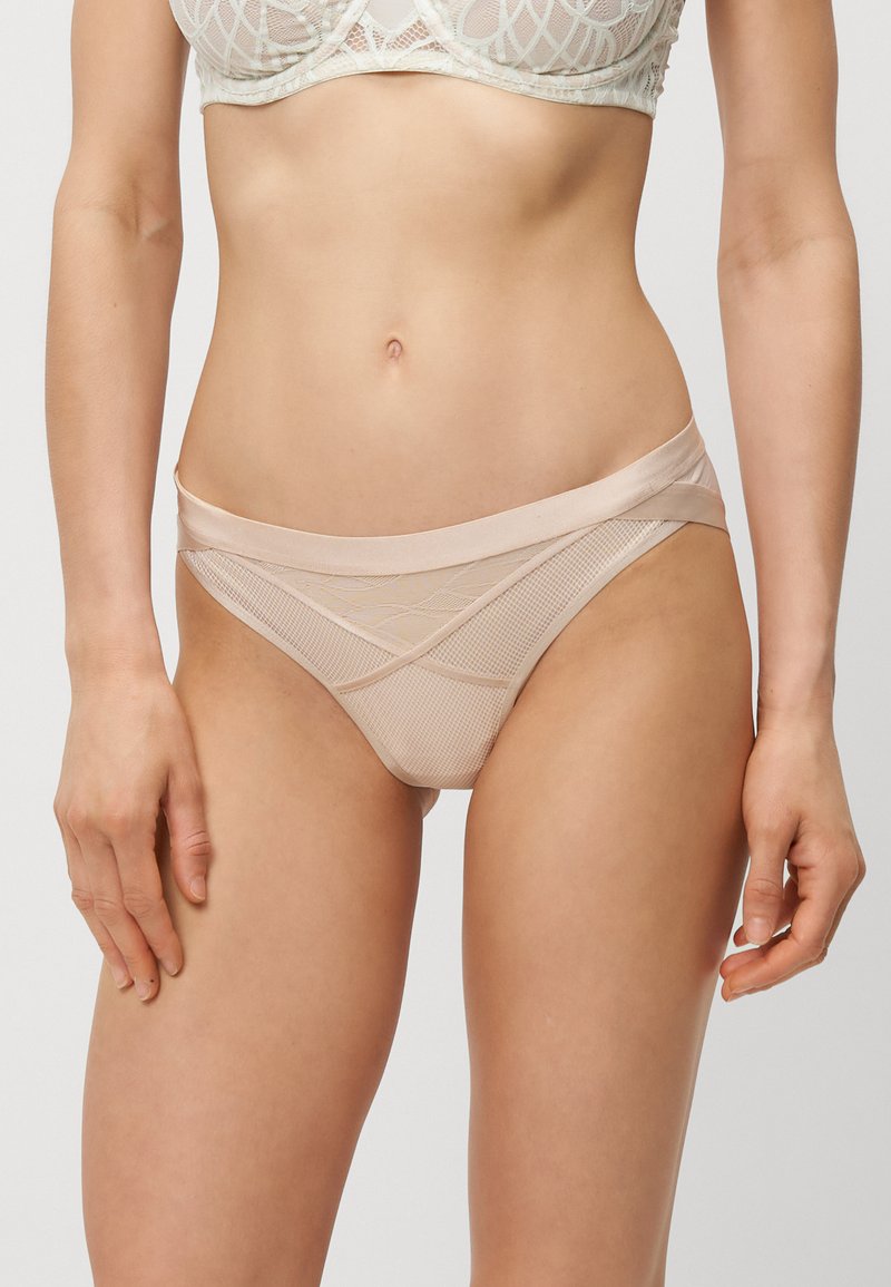 Triumph Trosor beige