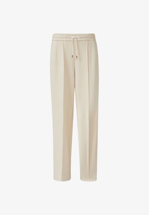Beige rechte broek met elastische tailleband en witte trekkoorden, met plooien aan de voorkant voor een getailleerde uitstraling.