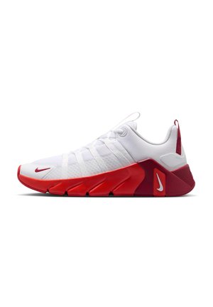 Zapatilla deportiva blanca con suela y detalles rojos, con empeine de malla, franjas laterales, lengüeta y logotipos de Nike en la puntera y el talón.