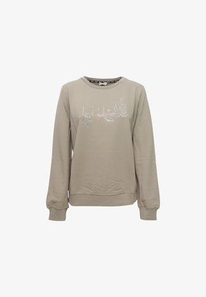 Felpa beige chiaro con maniche lunghe, scollatura rotonda e design di foglia ricamato scintillante sul davanti. Materiale in cotone morbido.