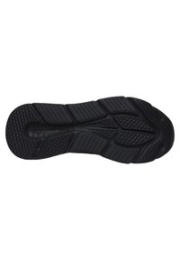 Schwarze Gummisohle mit strukturierten Oberflächen, die Rillen, Vertiefungen und Rautenmuster aufweist, um die Traktion und den Grip zu verbessern.