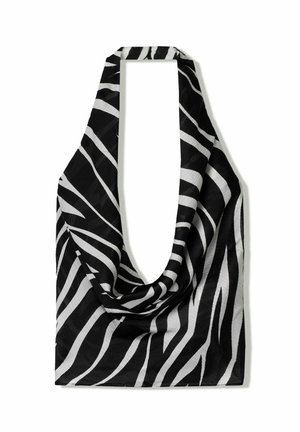 Top halter cu dungi de zebră alb-negru, realizat dintr-un material ușor, având un decolteu adânc și un design cu spatele deschis.