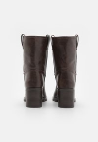 Call it Spring Botines camperos - dark brown