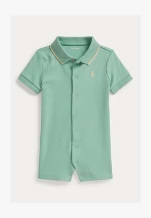 Mintrohelises puuvillases kangas polo-kaelusega lühike romper, millel on kollase äärisega krae, ees nupud, lühikesed varrukad ja väike logodetail.
