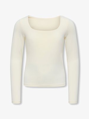 Top a maniche lunghe color crema con scollo quadrato e silhouette aderente, mostrato su sfondo bianco.