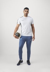 Nike Performance INTER NIKE DF STRIKE PANTS - Pantalon de survêtement - diffused blue/lyon blue/sanddrift