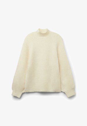 Suéter color crema hecho de material de punto acanalado. Presenta un cuello alto y costuras de hombro caídas. Textura suave con un ajuste relajado.