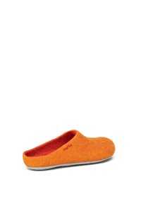 Orange felt slipper with red interior lining, rounded shape, open back, and a flat, gray sole. Minimal branding in red on side.