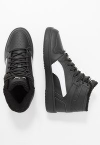 Black high-top sneakers with white side stripes, black laces, and fuzzy linings, shown from top and side views on a white background.