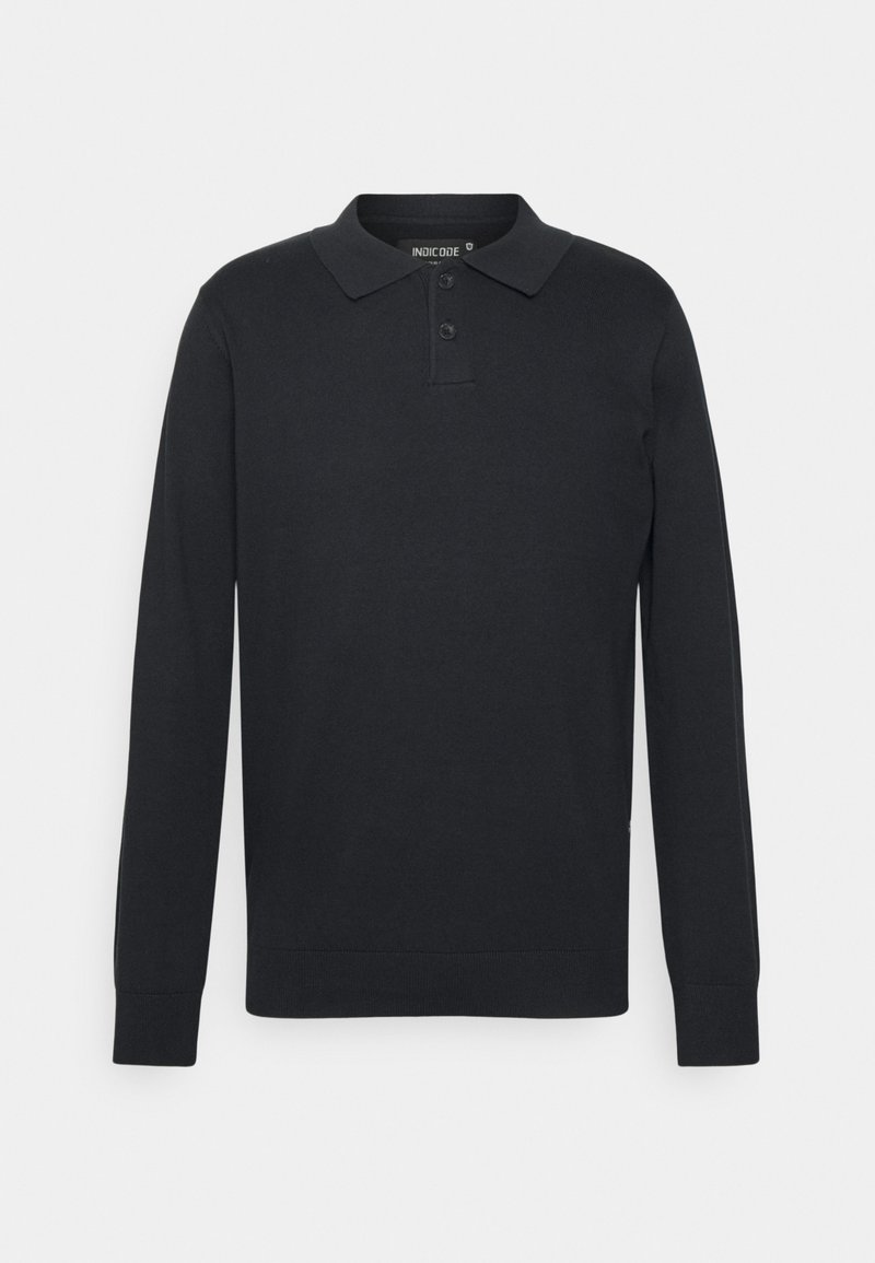 Polo shirt a maniche lunghe nera realizzato in cotone, con colletto, patta con tre bottoni e polsini a costine. Design semplice e classico.