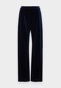 Pantalons à jambes larges en velours bleu marine avec taille haute, présentant des plis à l'avant et une texture lisse. Aucun hardware ou motif visible.