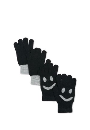Cuatro guantes de punto negros con puños grises, dos pares lisos y dos pares con caras sonrientes blancas en la parte trasera.