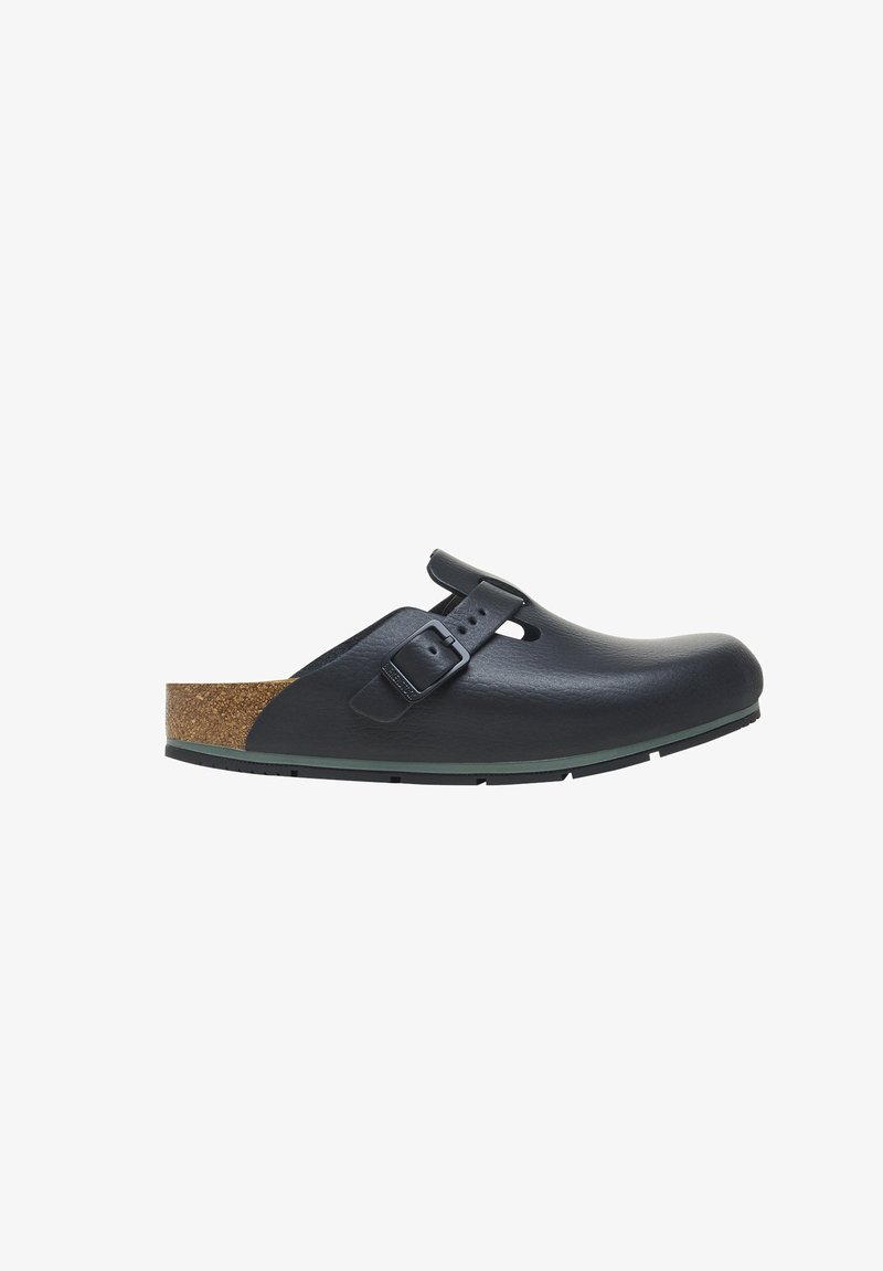 Black leather clog with adjustable strap, cork footbed, and rubber outsole. Features a smooth finish and rounded toe design.