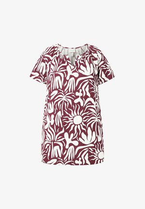 Blouse à manches courtes avec fond bordeaux et formes blanches abstraites ressemblant à des plantes et des soleils, avec un petit col en V.