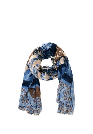 Sciarpa morbida con motivi floreali e geometrici blu, beige e marroni, piegata in modo disordinato con bordi sfrangiati.