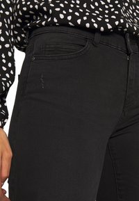 Noisy May NMLUCY  - Ļoti pieguloši džinsi - black denim