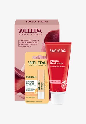 Weleda granatæble håndcreme tube, læbepomade stift med bivoks og lyserød emballage med granatæblegrafik.