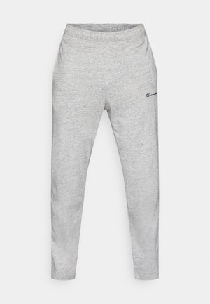 Graue Jogginghose aus weichem Stoff, mit konisch zulaufendem Bein und elastischem Bund. Mit kleinem dunkelblauem Logo-Detail am linken Oberschenkel.