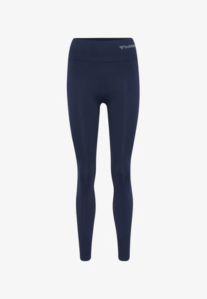 Leggings de sport bleu marine sans couture avec une large ceinture, jambes ajustées, et petit logo colibri près de la taille.