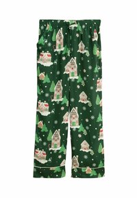 Green pajama pants featuring a holiday-themed pattern of houses, trees, and snowflakes with a drawstring waist and cuffed hems.