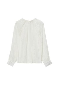 Camicia bianca con pieghe verticali, scollatura rotonda, maniche lunghe e polsini con bottoni. Realizzata in un tessuto leggero e liscio.