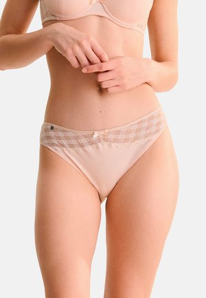 Culotte bikini en tissu côtelé nu avec dentelle, dotée d'un nœud décoratif à la taille et d'un petit accent de marque sur le côté.