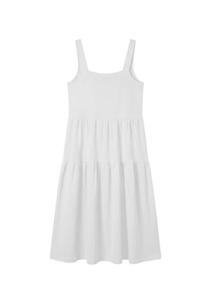 Robe blanche sans manches avec de larges bretelles, un corsage ajusté et une jupe froncée à deux volants.