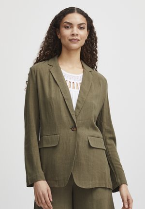 Olivově zelený lněný blazer s klopovým límcem, předním zapínáním na jeden knoflík a dvěma postranními kapsami. Navržen s pohodlným střihem a dlouhými rukávy.