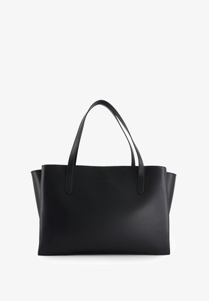 Sort læder tote taske med to robuste håndtag, åben topdesign, minimalistruktur, glat tekstur og subtil branding på forsiden.
