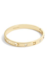 Bracciale a bangles in tono oro con lettere ritagliate e strass trasparenti. Finitura metallica liscia con chiusura a cerniera per un facile indossamento.