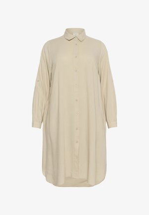 Beżowa sukienka koszulowa zapinana na guziki, wykonana z miękkiego materiału. Posiada kołnierzyk, długie rękawy oraz zaokrąglony dół z bocznymi rozcięciami dla swobody ruchów.