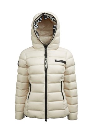 Veste rembourrée beige avec capuche, fermeture éclair noire, deux poches zippées, et branding noir "JACKIT" sur la fermeture éclair et la poche poitrine.