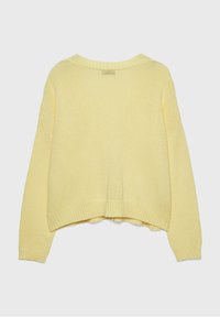 Yellow, knitted sweater featuring a loose fit, wide sleeves, and ribbed hem. The back has a rounded neckline and subtle texture.