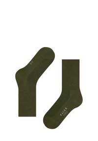 Olijfgroene crew-sokken van een zachte, ribbelige stof. Bevat subtiele branding aan de zijkant. Glad textuur met een klassieke pasvorm.