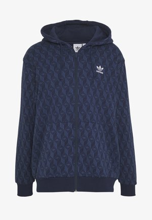 Navyblauwe Adidas zip-up hoodie met geometrisch patroon, trekkoorden aan de capuchon, voorzakken en wit Adidas-logo op de linkerborst.