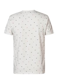 Bílé tričko s krátkými rukávy, zdobené rozptýleným vzorem malých modrých a růžových tvarů. Vyrobeno z měkké bavlny s kulatým výstřihem.