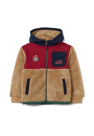 Giacca con cappuccio con parte superiore rossa e blu navy, corpo in pelo color sabbia, con una toppa di Super Mario e tasche frontali. Chiusura con zip e polsini a costine.