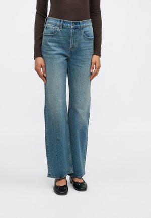 Traperice opuštenog kroja - blue denim