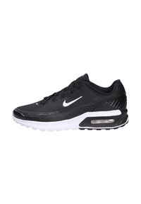 Sneaker Nike Air Max con tomaia in rete nera, logo bianco, suola ammortizzata e unità d'aria trasparente per un comfort aggiuntivo.