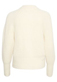 Krämfärgad tröja med texturerad stickning, raglanärmar och rundad halsringning. Slutet är något kortare och ribbat.