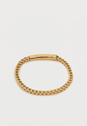 Gold-colored stainless steel chain bracelet with a sleek magnetic clasp on a white background.