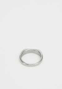 Shiny silver twisted band ring with a smooth, rounded surface placed on a plain white background.