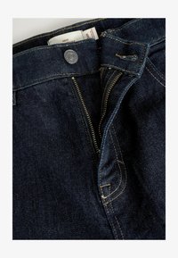 Seleccionado, blue indigo rinse