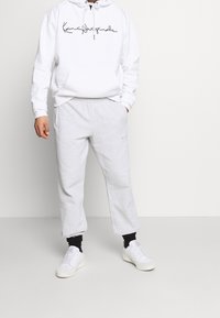 Karl Kani Mikina s kapucí - white