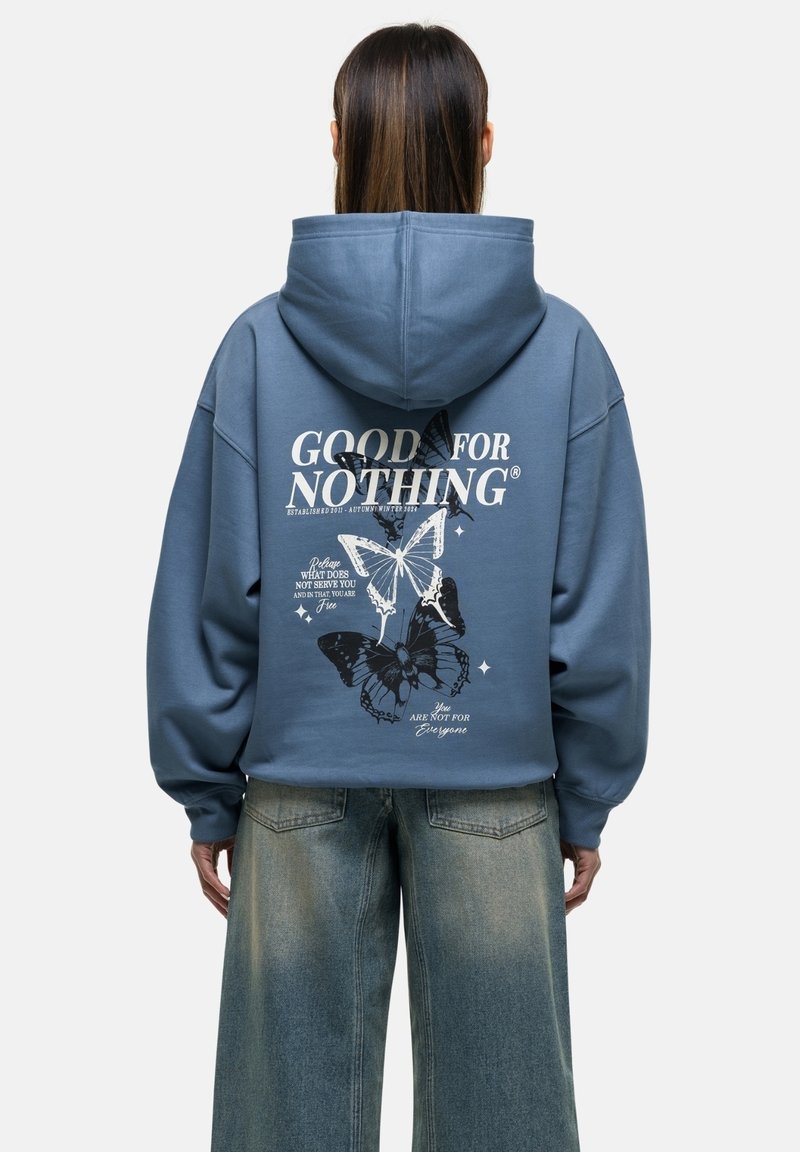 Hooded sweatshirt in slate blue, featuring a butterfly graphic and bold text on the back. Loose fit with ribbed cuffs and hem.