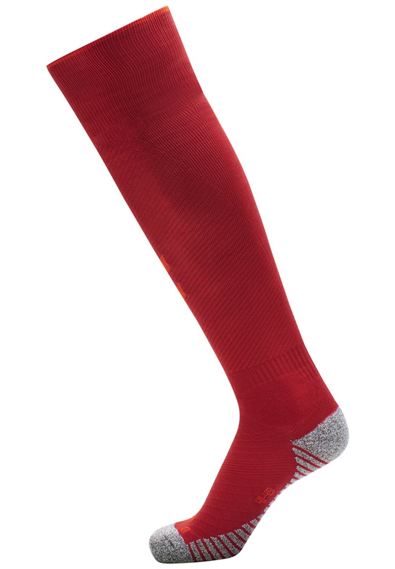 Czerwona skarpeta do kolan z żebrowaną strukturą, górna część jednolita, a pięta i palce wzmocnione szarym kolorem. Posiada pomarańczowe akcenty dla lepszej widoczności.