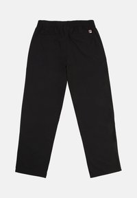 Zwarte, elastische broeken met een relaxte pasvorm. Beschikt over achterzakken en een klein logoaccent. Gemaakt van lichte stof.