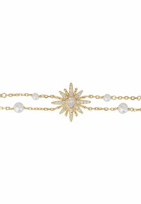 Gold-tone bracelet featuring a starburst charm adorned with clear crystals, flanked by three textured white pearls on delicate chains.