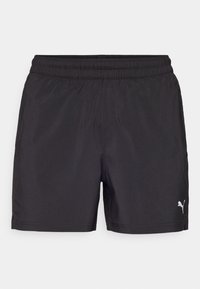 Svarta shorts i lätt material med elastisk midja. Har en liten vit Puma-logga på nedre högra sidan.